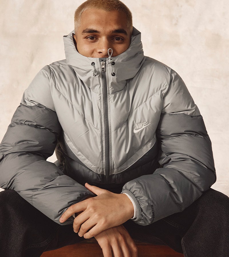 Photo of a man in a Nike puffer jacket