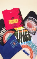 SHOP GRAPHIC TEES