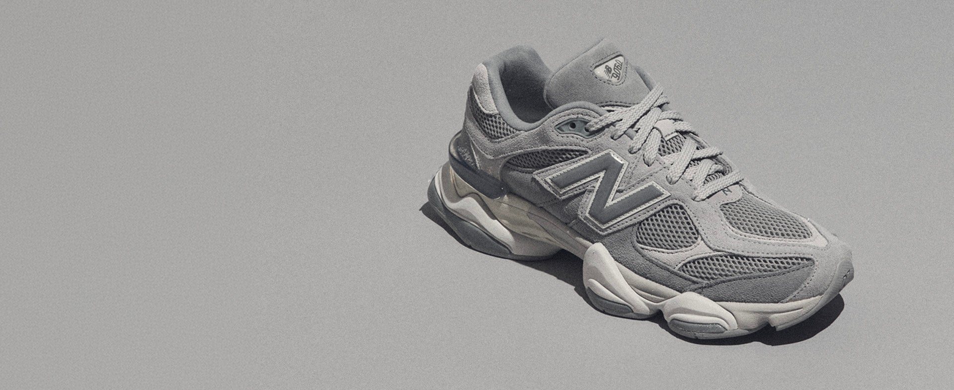 9060 ICON in GREY New Balance heritage reworked with bold shape and clean grey style. SHOP THE STYLE