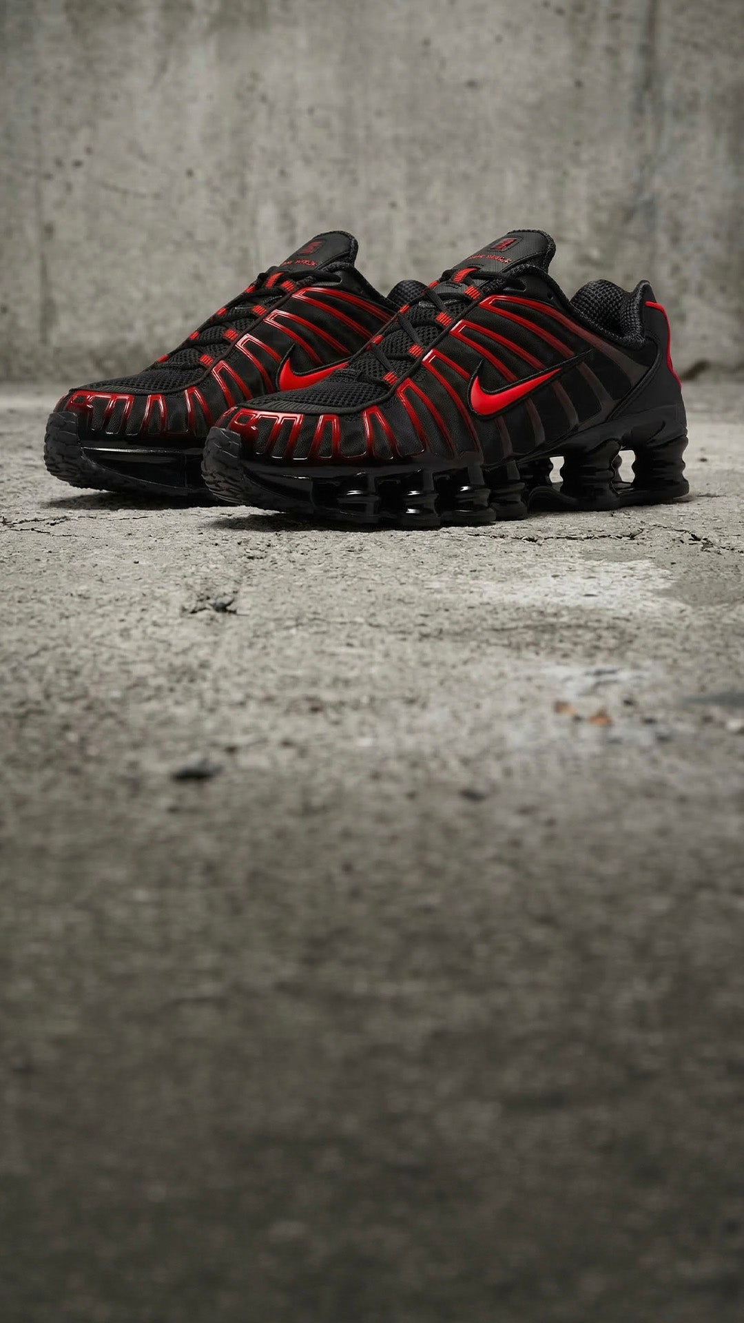 OWN THE STREET. Nike Shox TL brings bold cushioning in black and crimson. SHOP SHOX