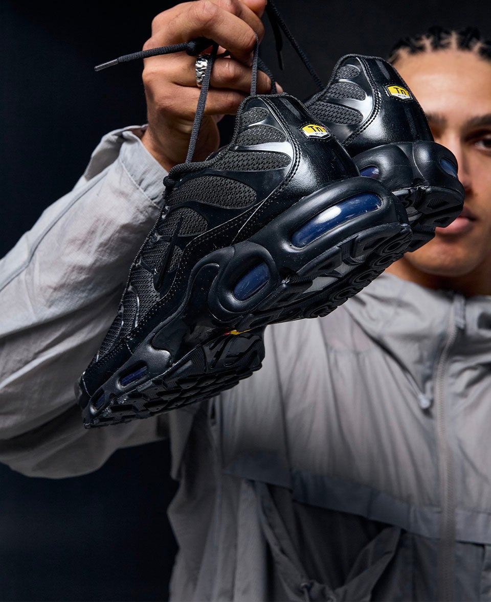 BAT BLACK TN 1. Icon energy, Tuned Air cushioning, pure blackout attitude. SHOP THE STYLE
