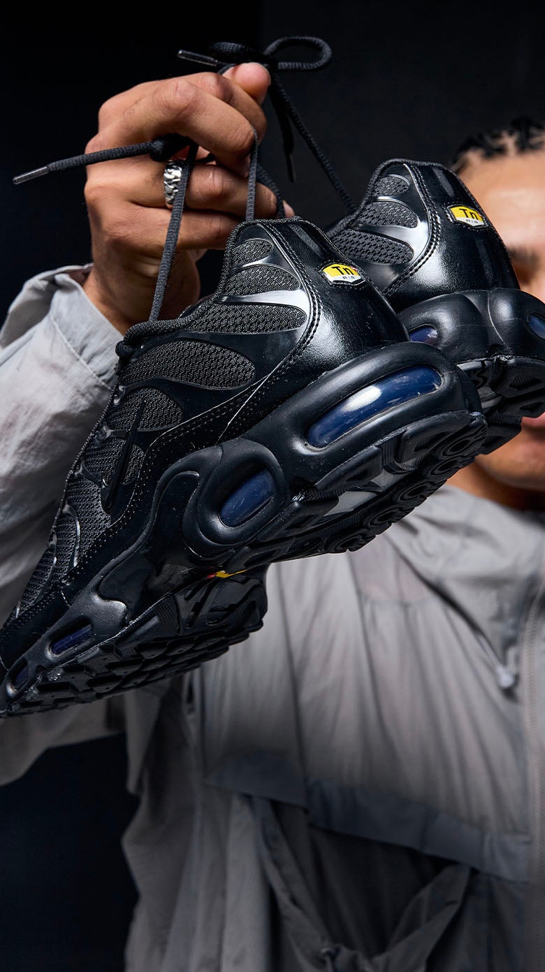 BAT BLACK TN 1. Icon energy, Tuned Air cushioning, pure blackout attitude. SHOP THE STYLE