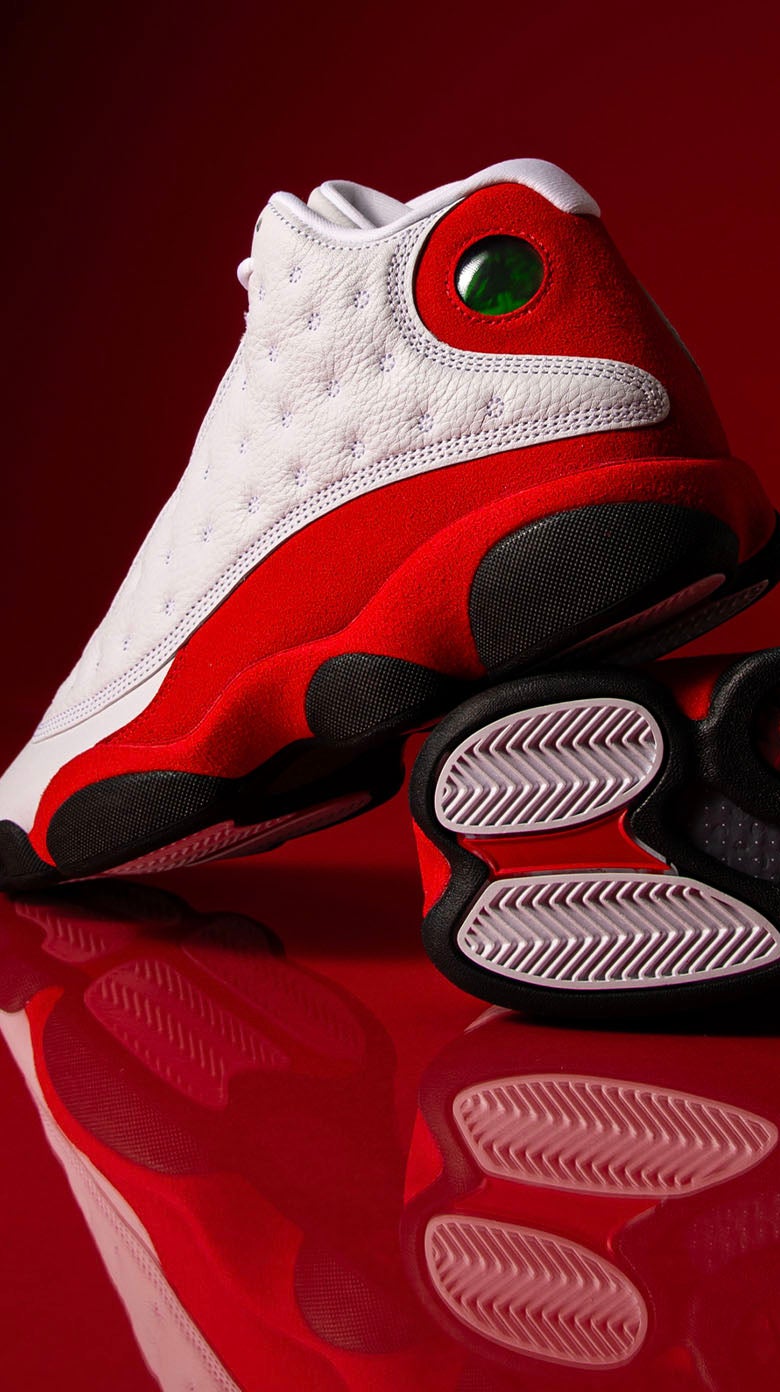 RETRO ROYALTY The Jordan Retro 13 ’Cherry’ delivers bold colour and iconic court heritage. SHOP THE STYLE