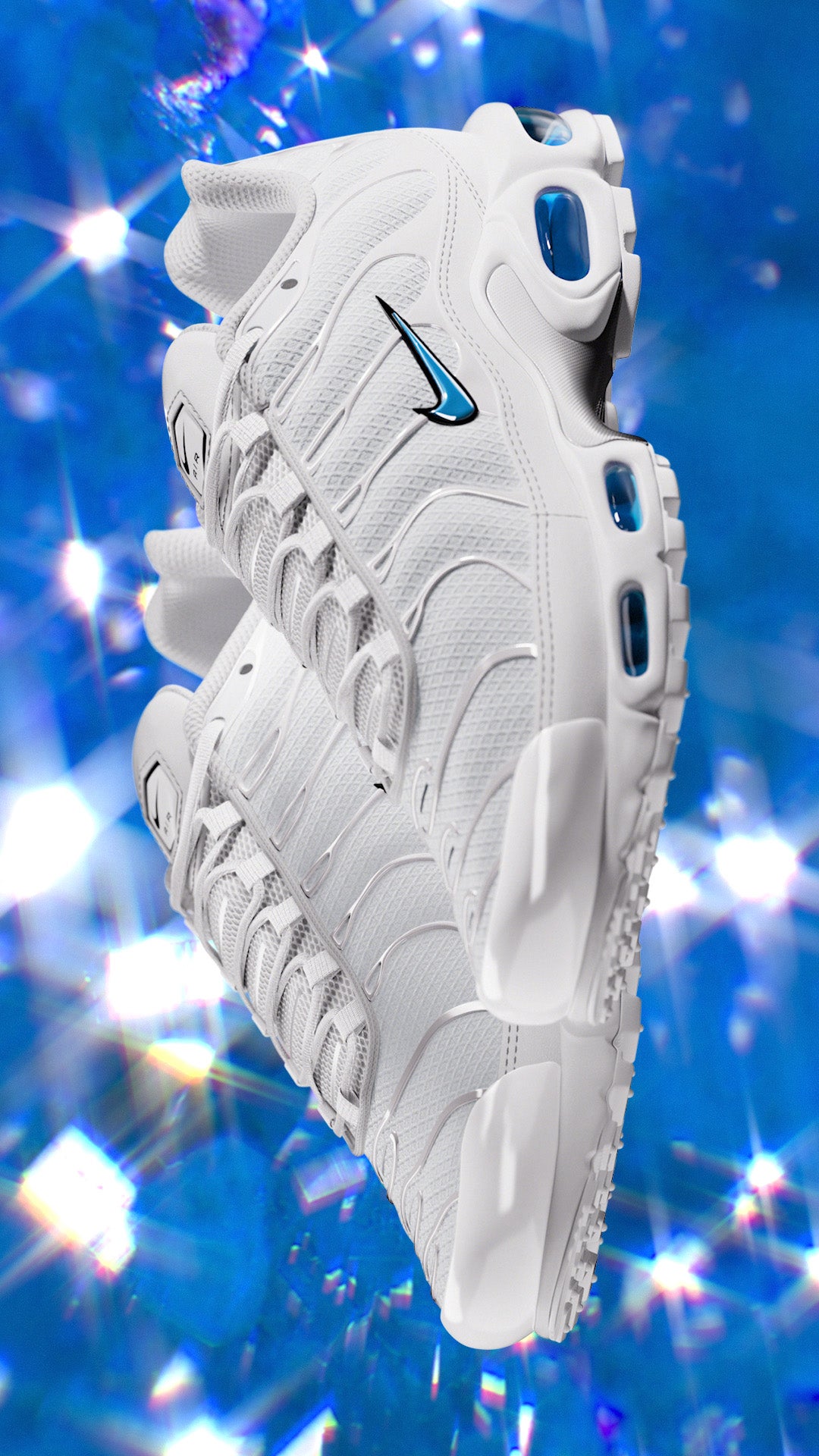 BLUE CRYSTAL The Nike TN1 arrives all white, iced with blue crystal accents and Tuned Air attitude. SHOP THE STYLE