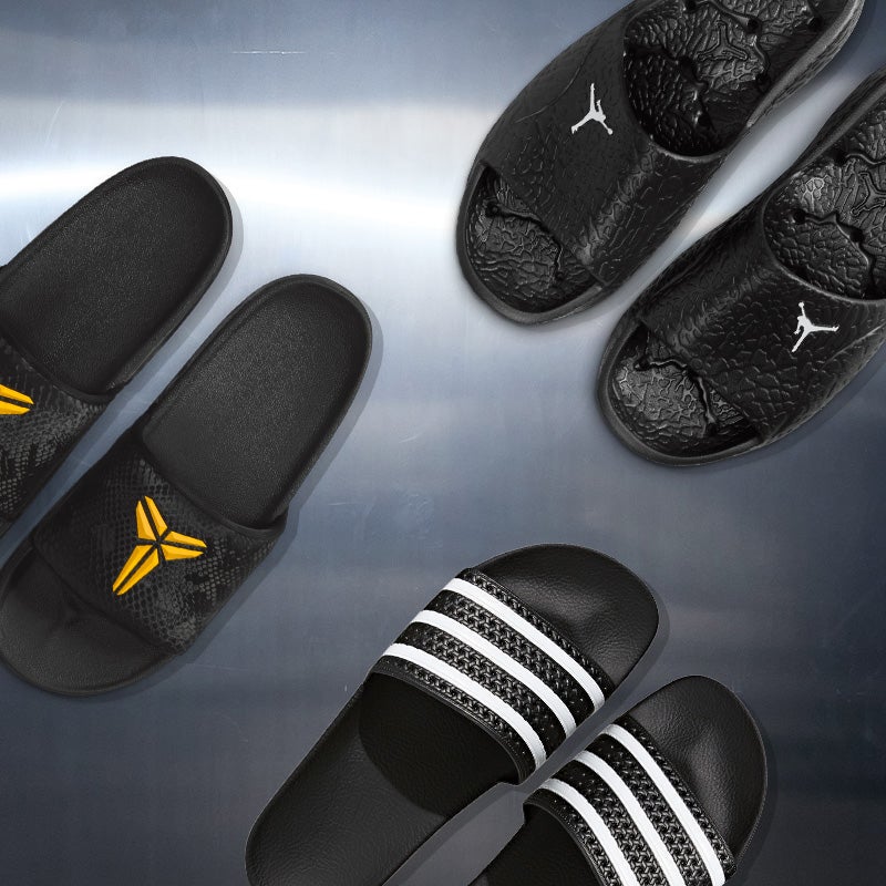 SLIDE SEASON Step into easy comfort from Nike, adidas, Jordan & more. SHOP THE STYLE