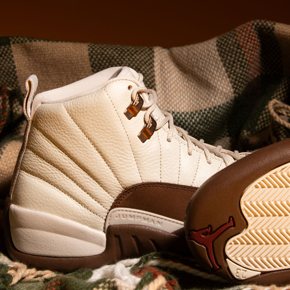 JORDAN 12 'FIRESIDE'. The Jordan 12 steps out in rich brown and clean neutral tones. SHOP THE STYLE