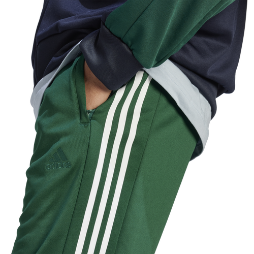 Adidas sst track pants green best sale