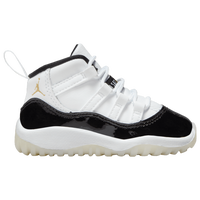 Jordan 11 negro con blanco bajito hot sale