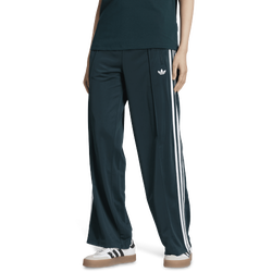 Pour femmes - adidas Pantalon ample Firebird - Bleu marine/Blanc
