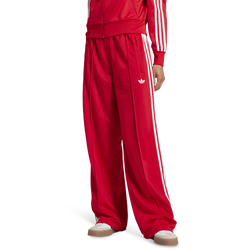 Pour femmes - adidas Pantalon ample Firebird - Blanc/Rouge