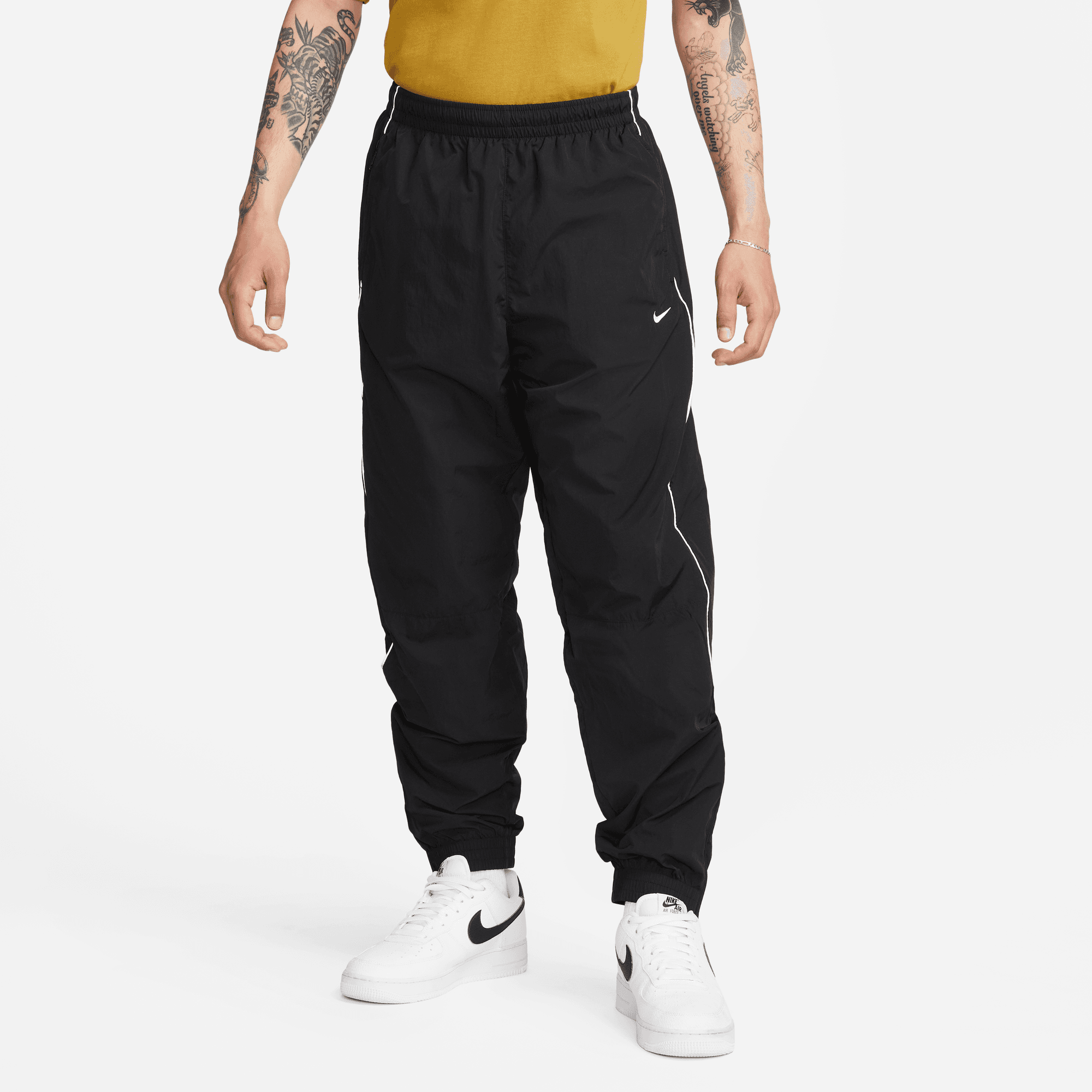 Order NIKE Solo Swoosh Woven Track Pant white/black Pants from