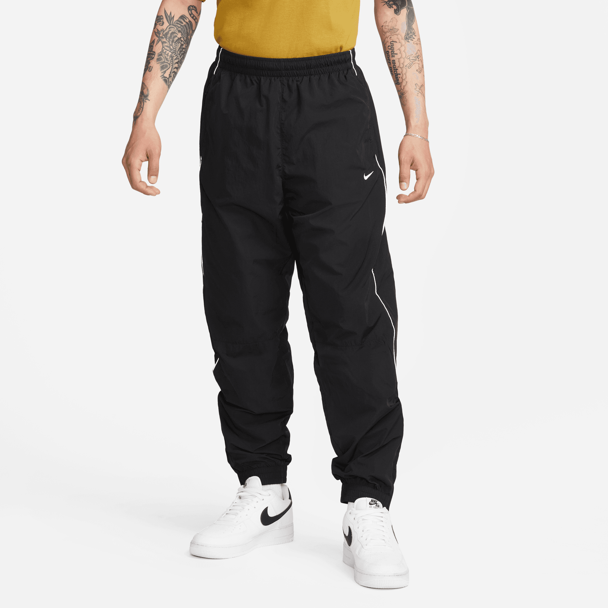 Order NIKE Solo Swoosh Woven Track Pant black/white Pants from solebox