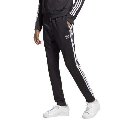 Adidas superstar track pants black online