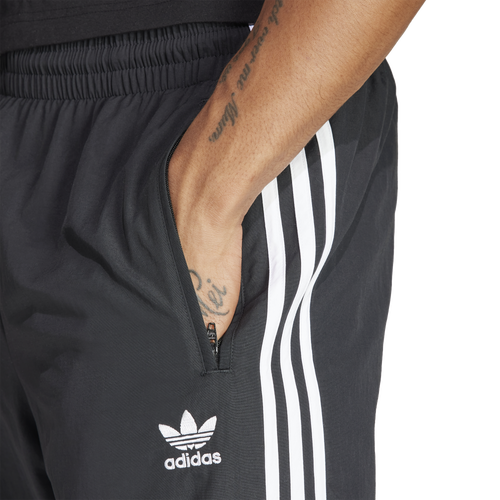 Adidas originals tape woven track pants on sale