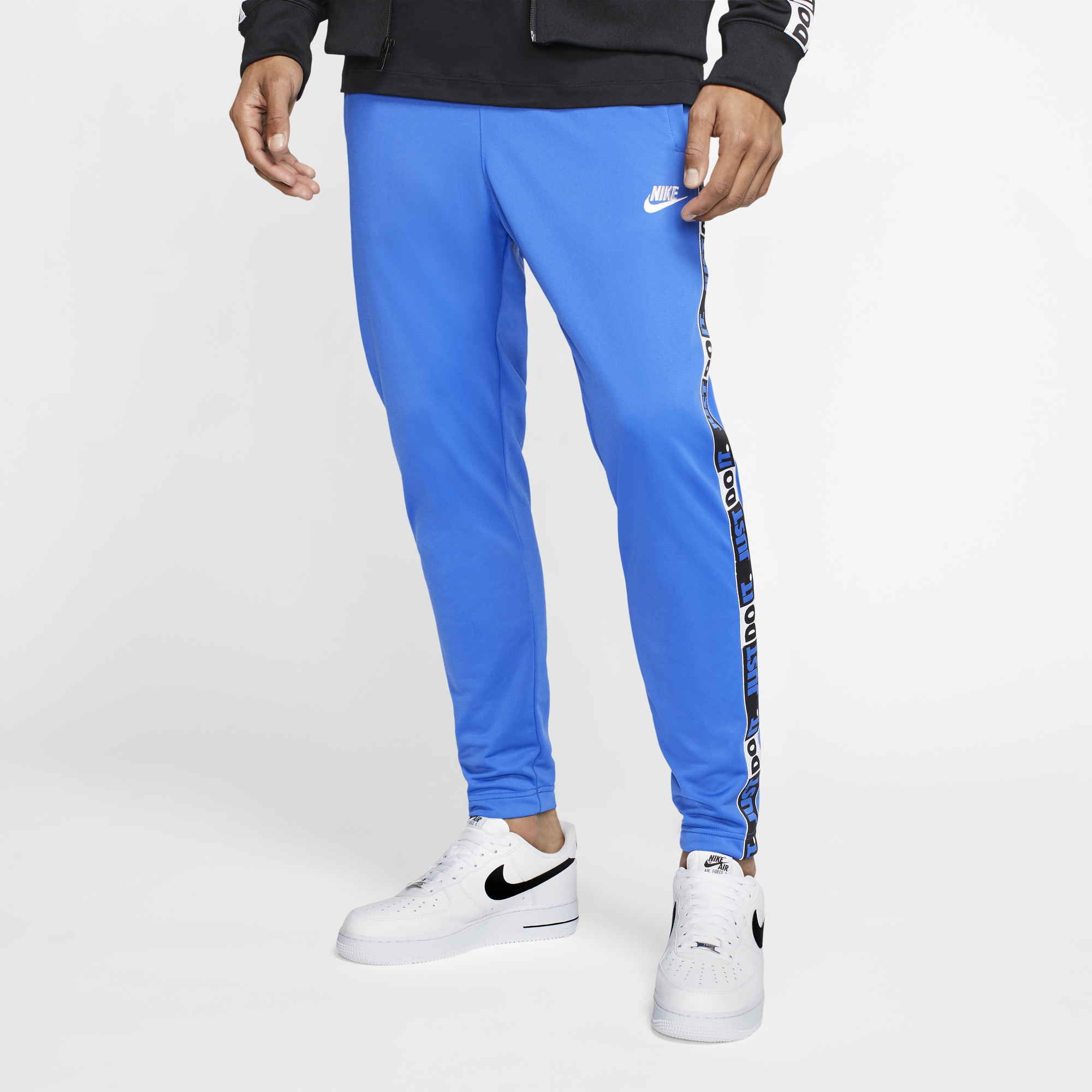 nike taped pants blue