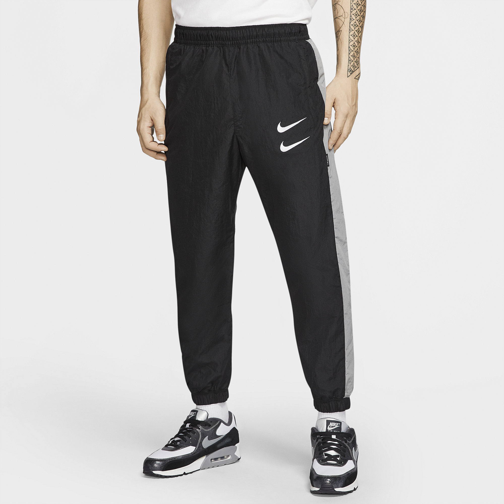 double swoosh nike joggers