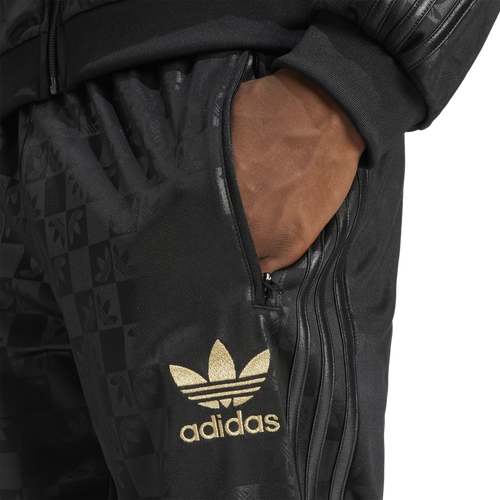 Adidas track pants gold online