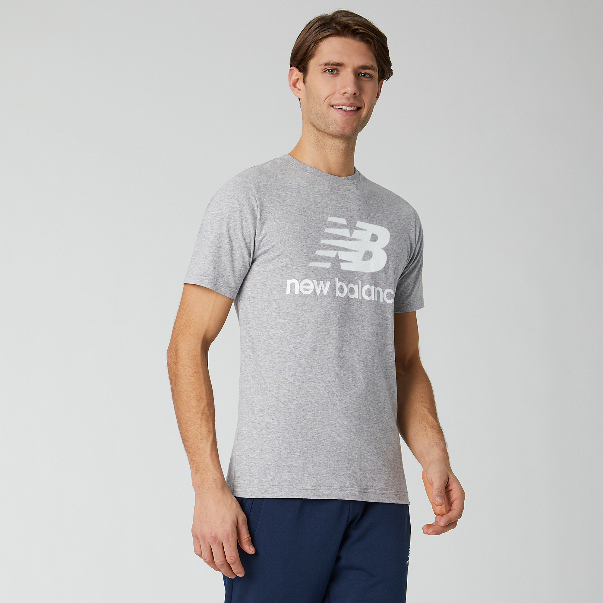 New Balance Essentials Stacked Champs | Logo Sports Tee