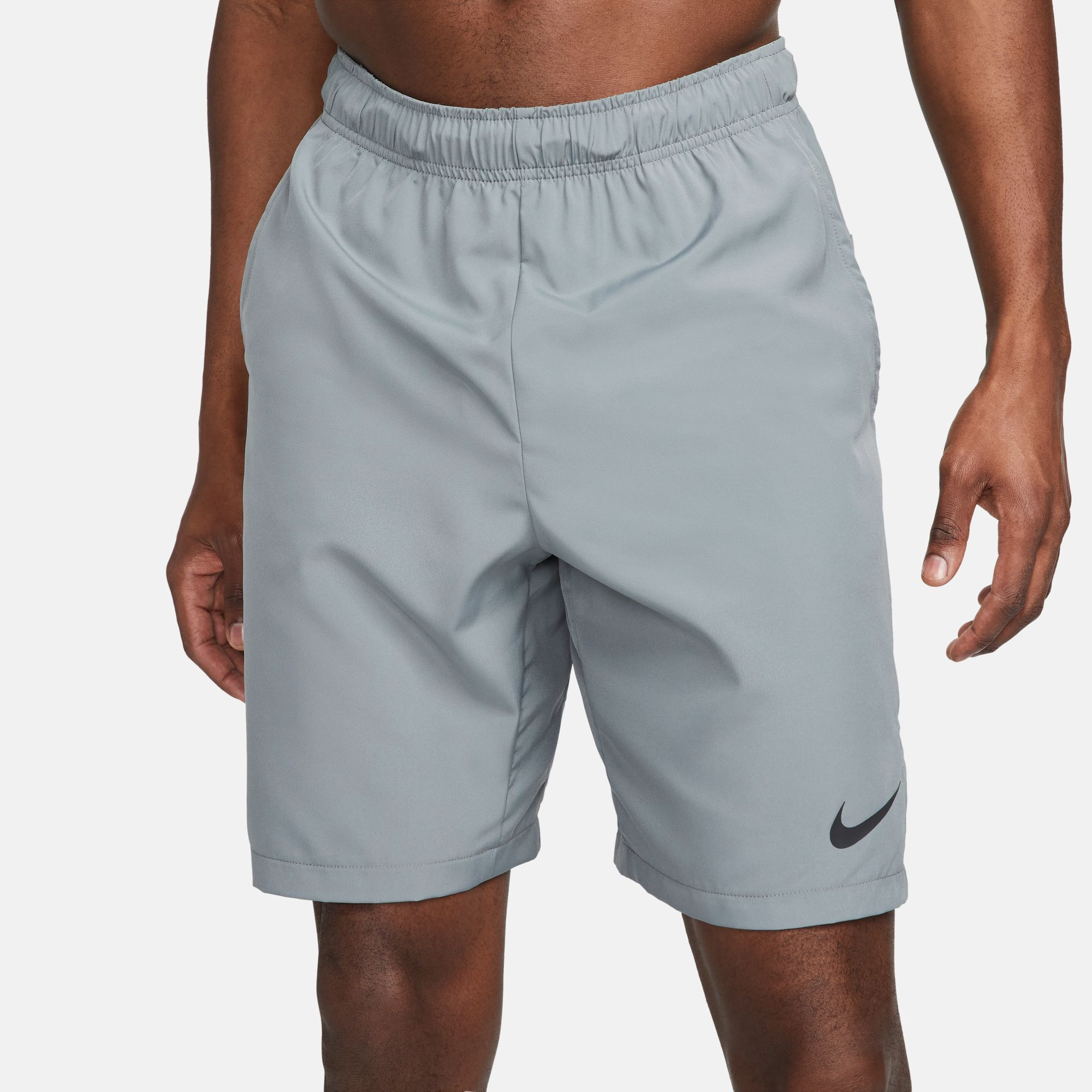 Buy the Nike Nike Flex Dri-Fit Woven Training Shorts in Grey/Black on