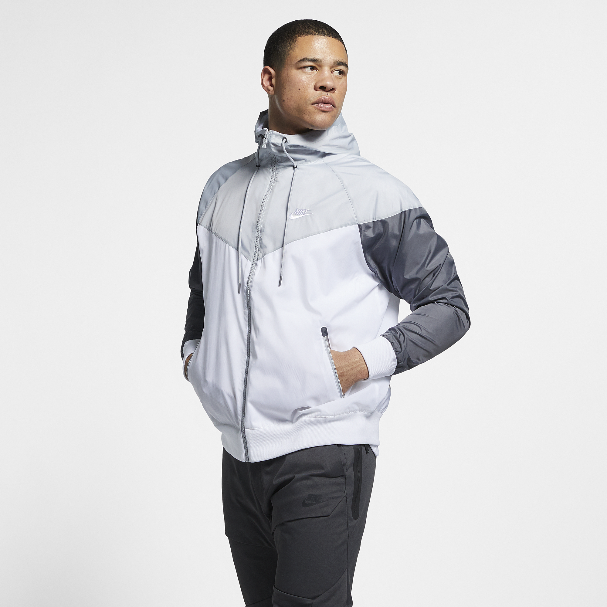 grey and white nike windbreaker