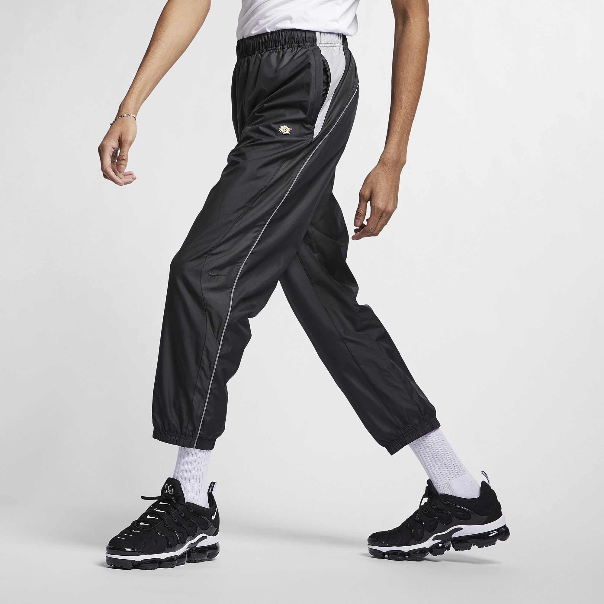 nike tuned air track pants