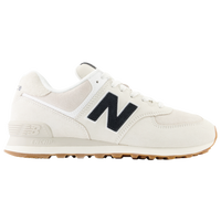 New Balance 574 trainers in metallic white and silver