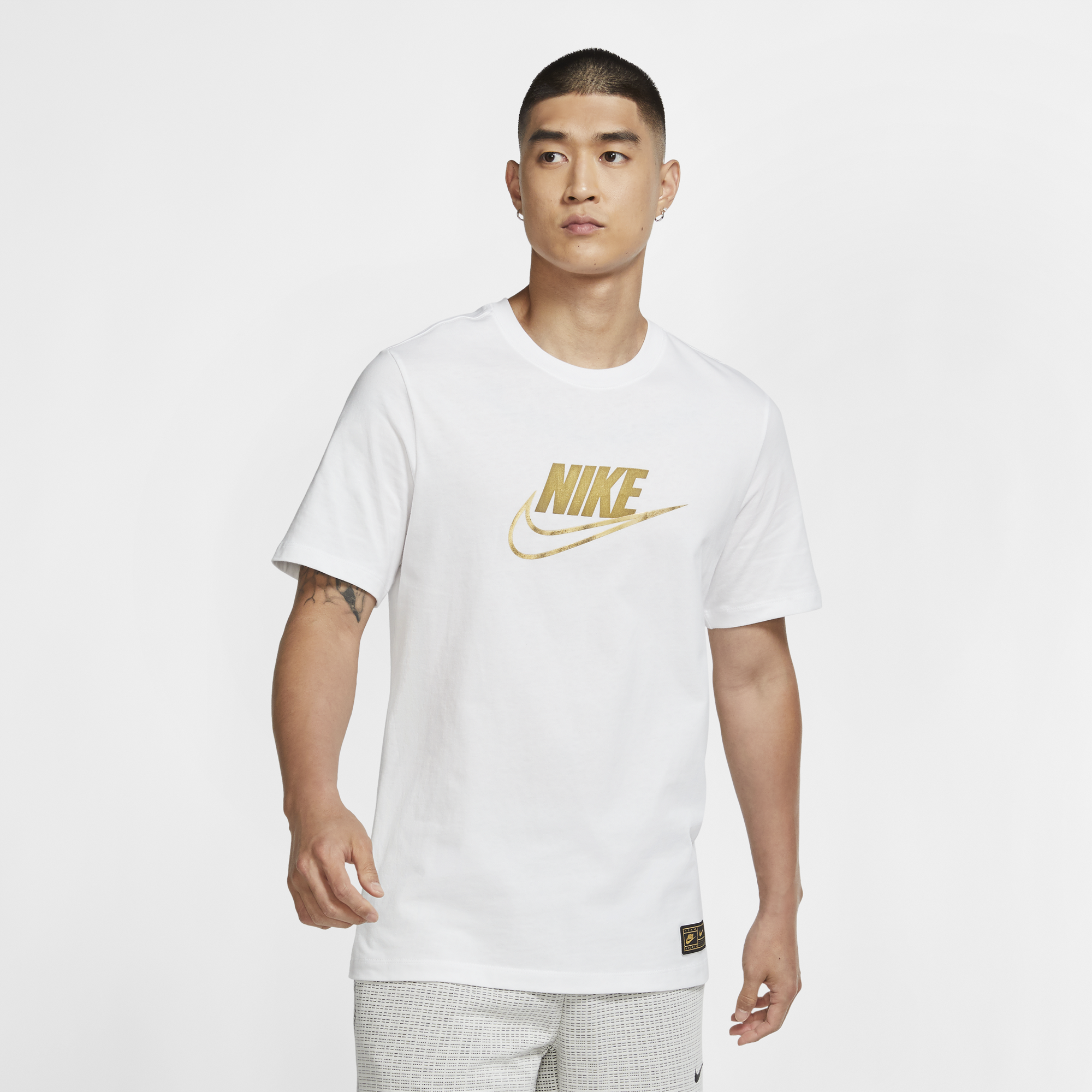 white and gold nike shirts
