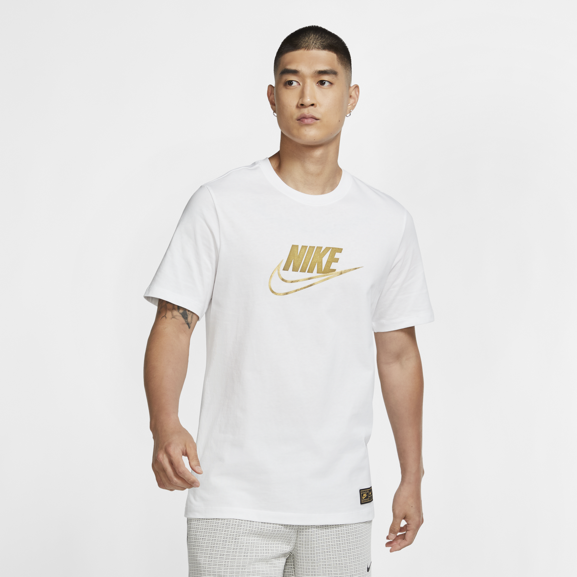 black gold and white nike shirt