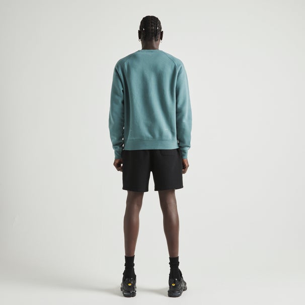 Nike NOCTA Pullover Fleece Crew Image 2 of 7. Tap to open photo gallery.