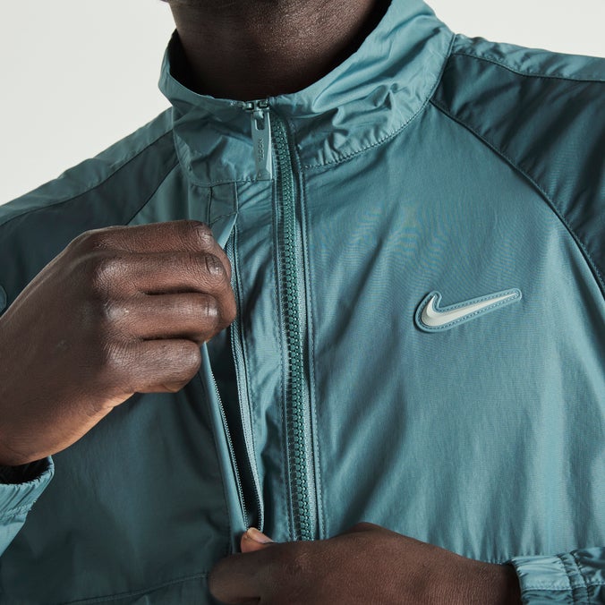 Nike NOCTA Northstar Nylon Track Jacket Image 8 of 10. Tap to open photo gallery.