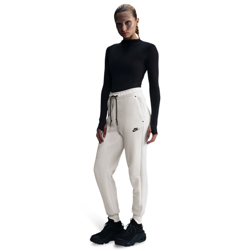 Nike Tech Fleece Mid Rise Joggers Image 1 of 5. Tap to open photo gallery.