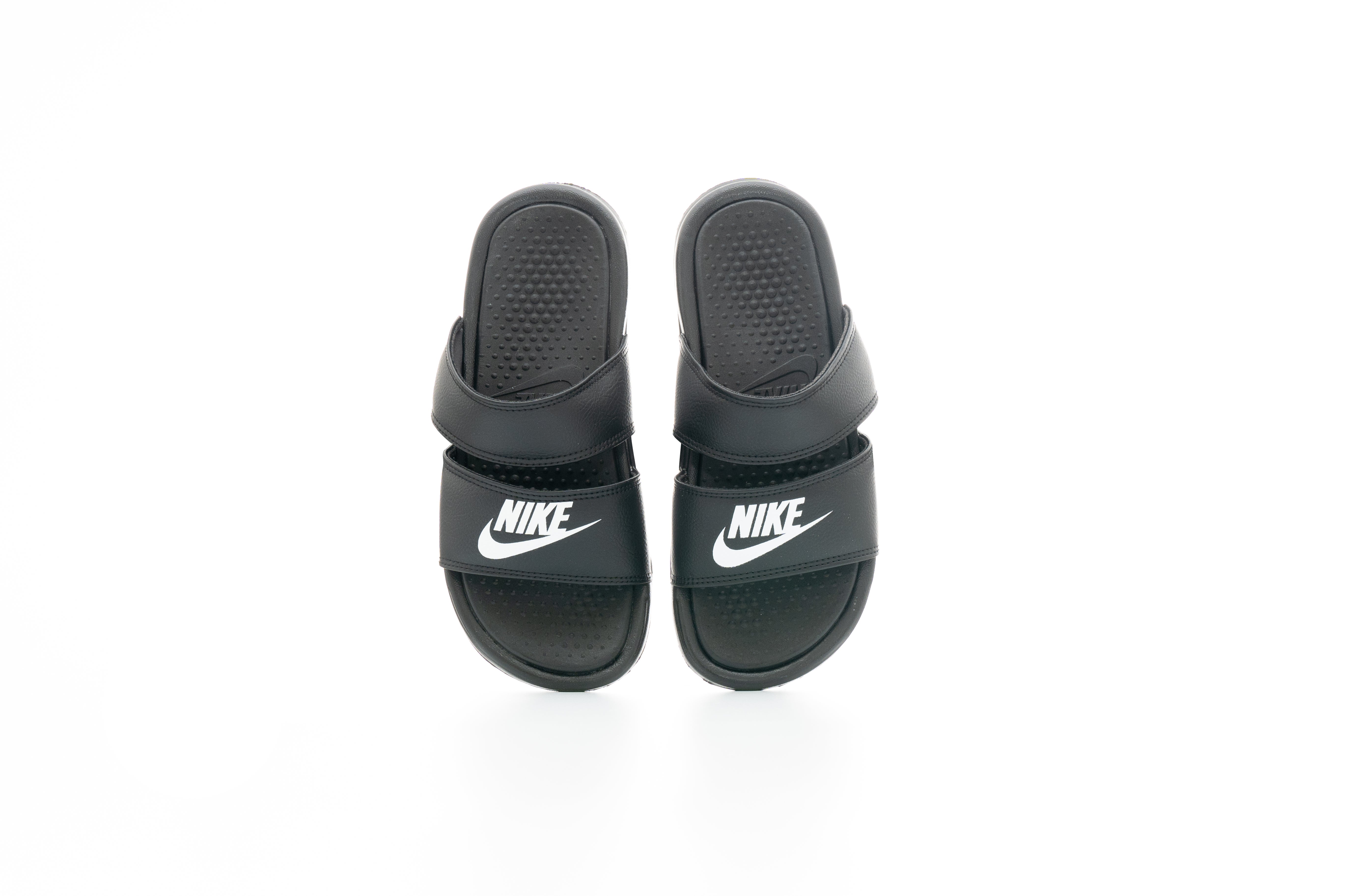 nike benassi slides footlocker