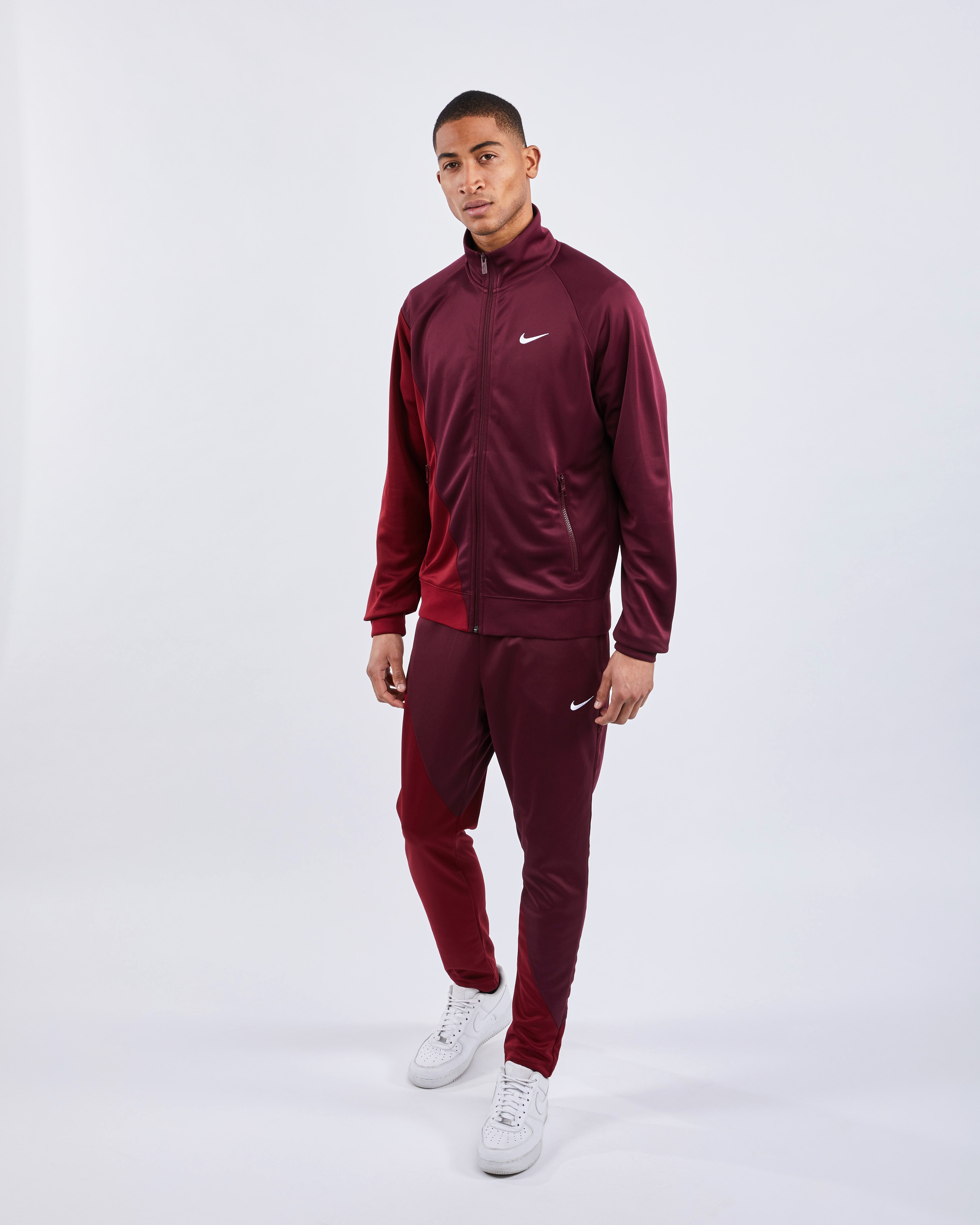 nike poly track pants mens