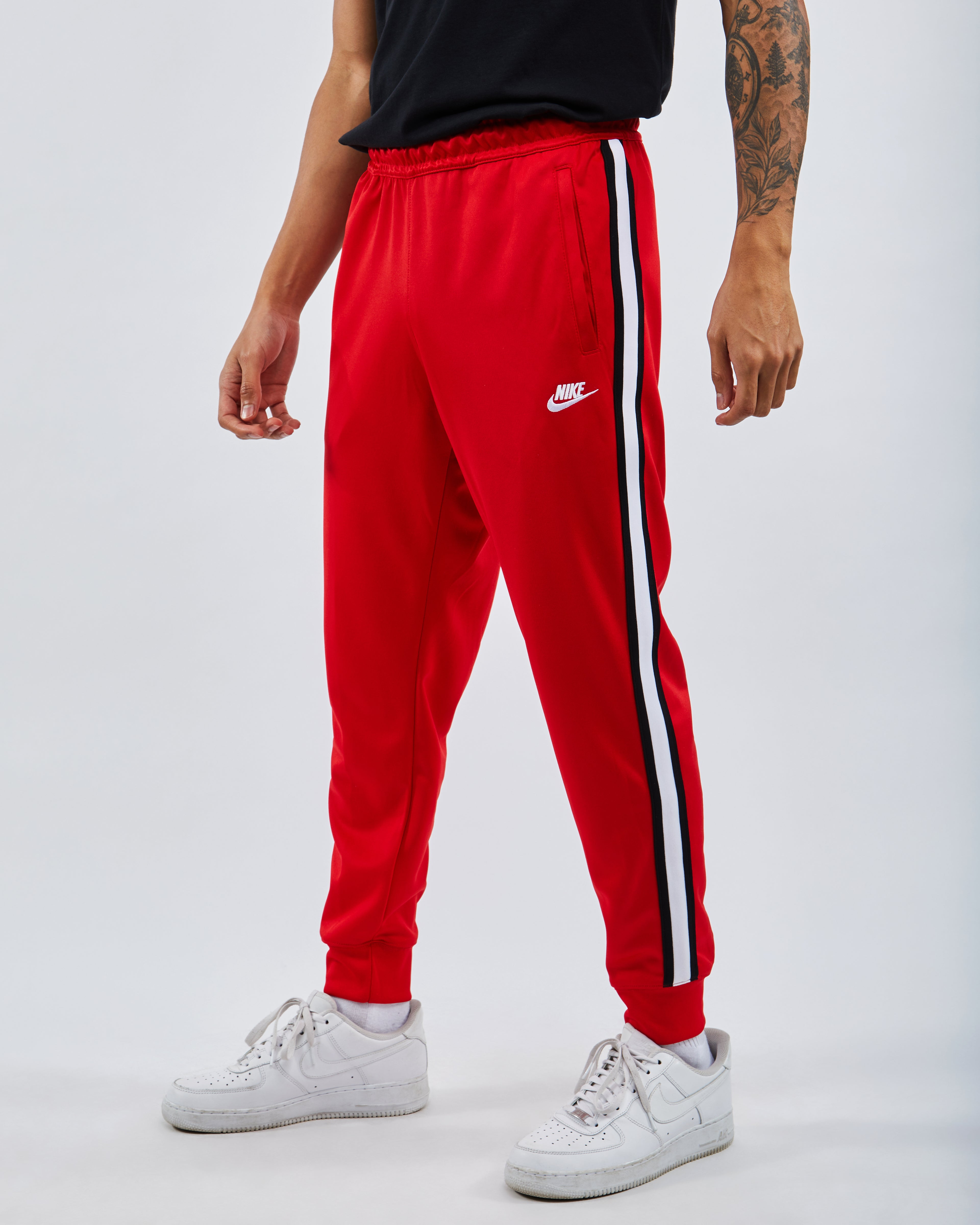 red nike tribute pants