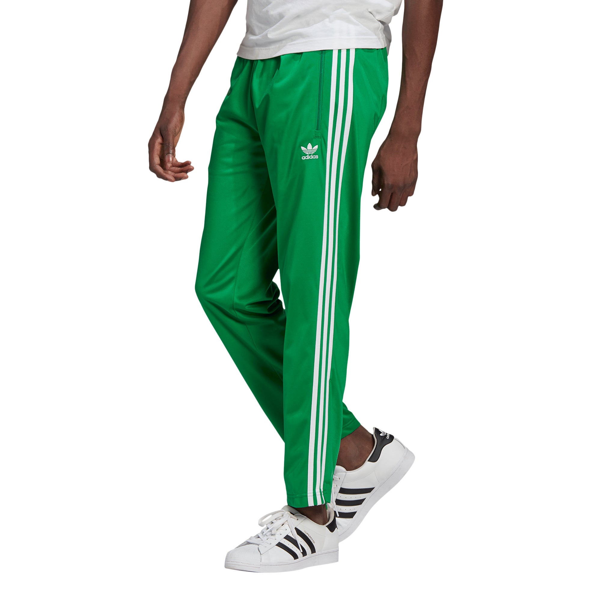green and white adidas pants