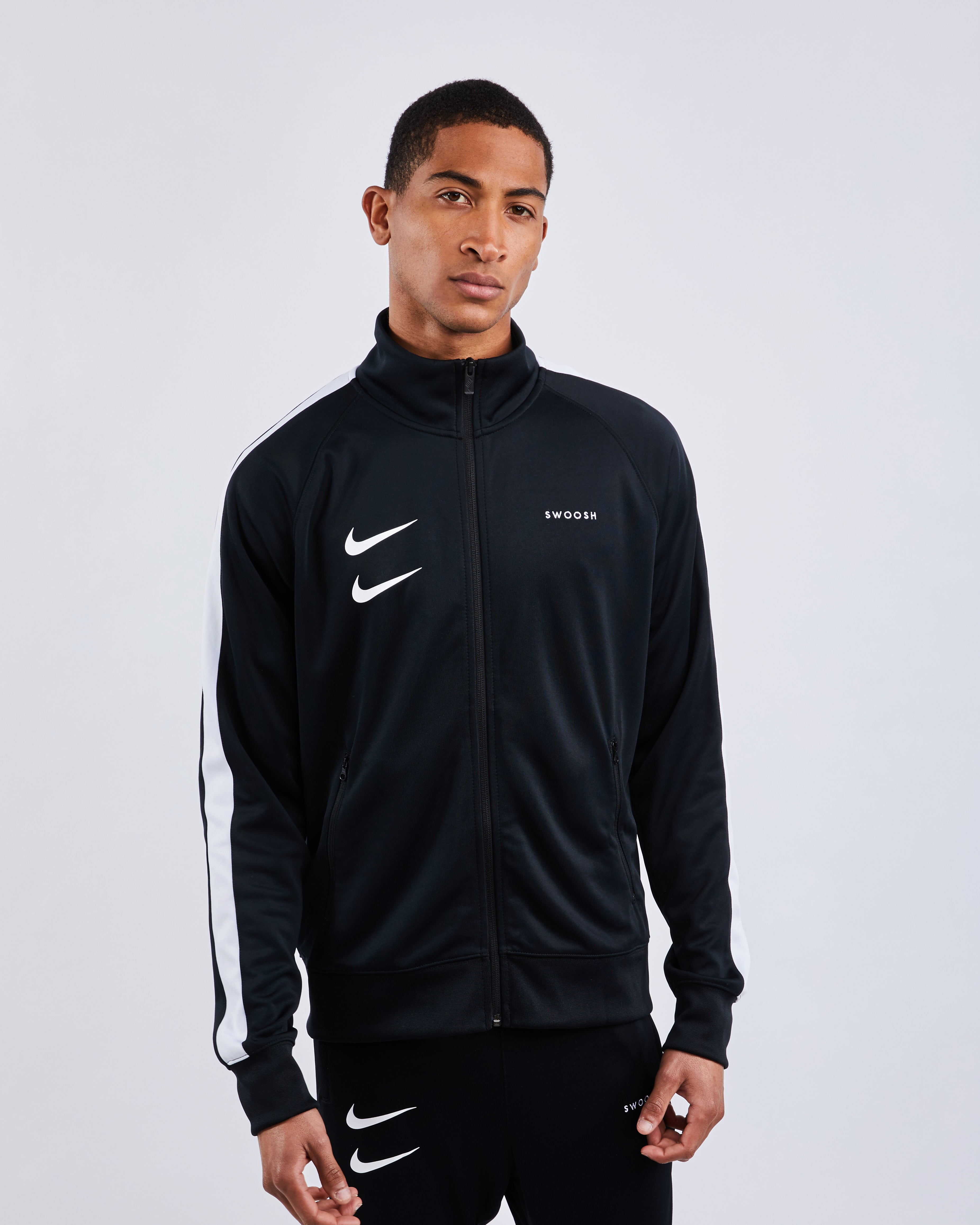 black nike track top