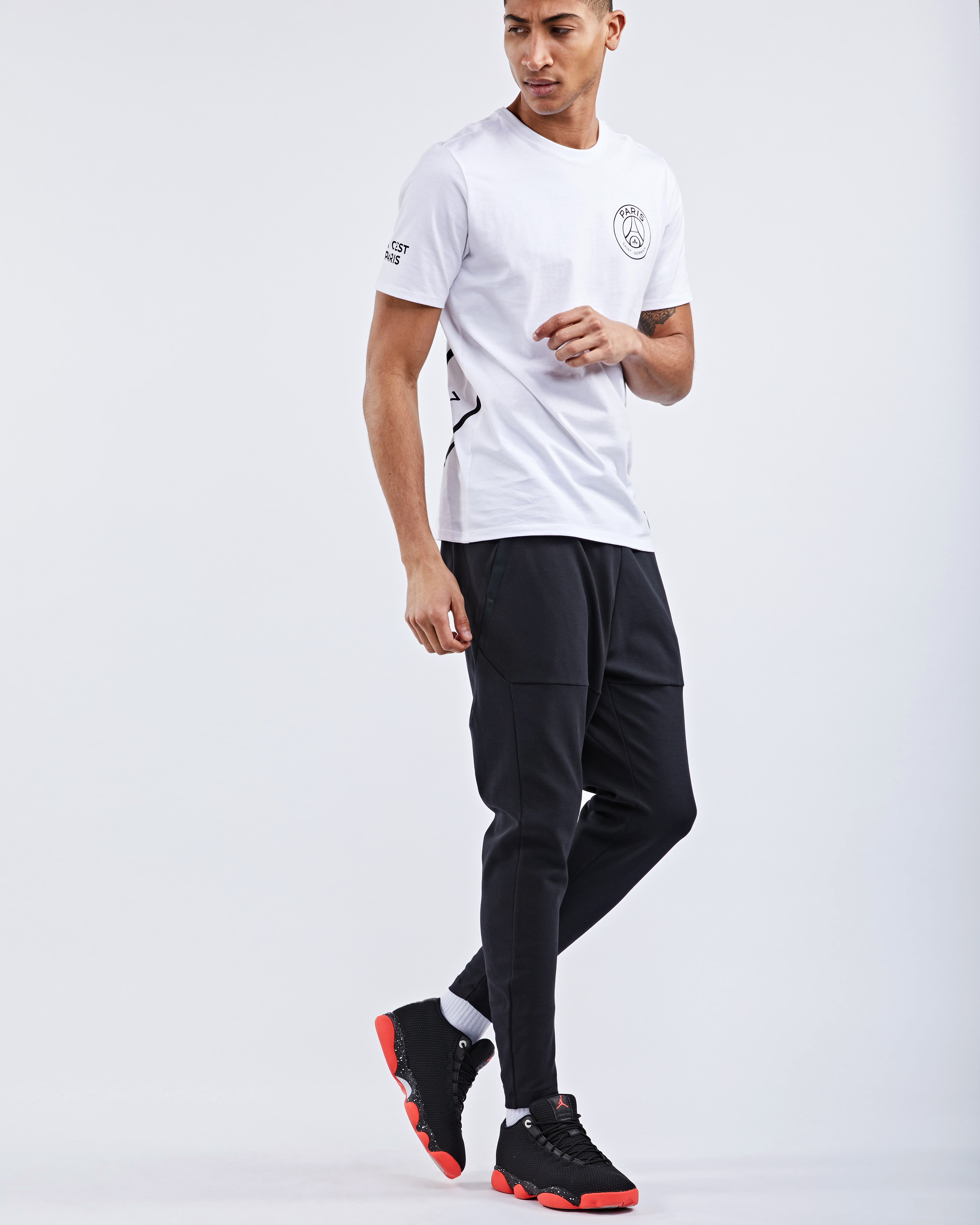 nike tech open hem pants