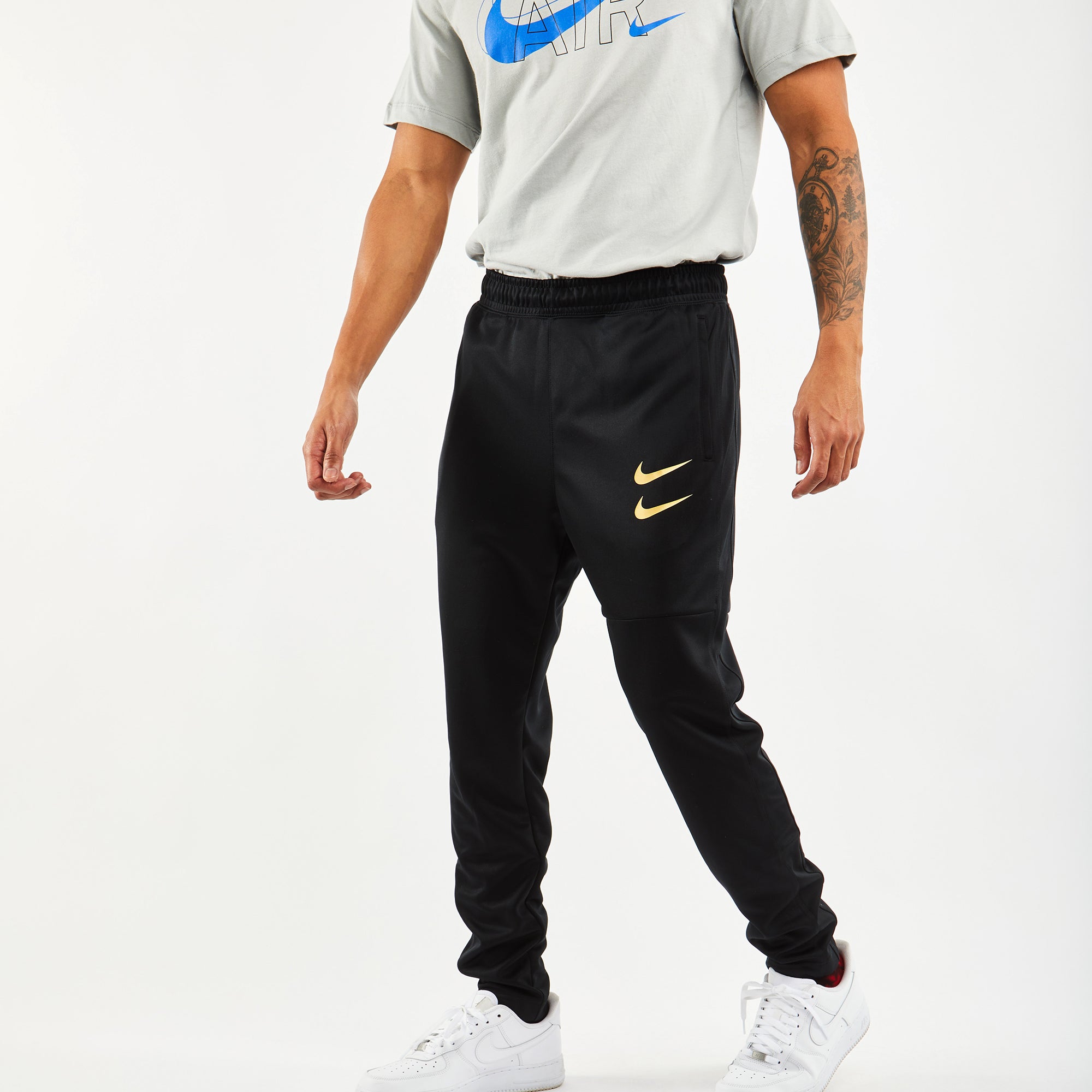 nike swoosh poly track pants