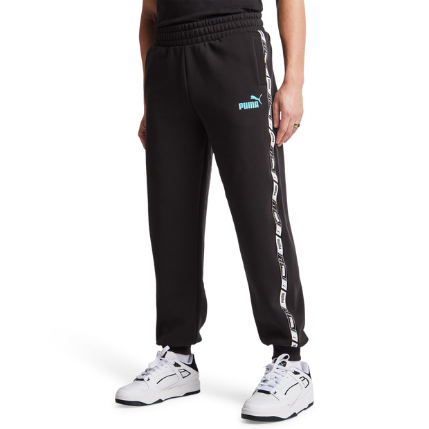 Image of Puma Essentials+ Tape male Pantaloni - Nero - Pile di cotone - Foot Locker035