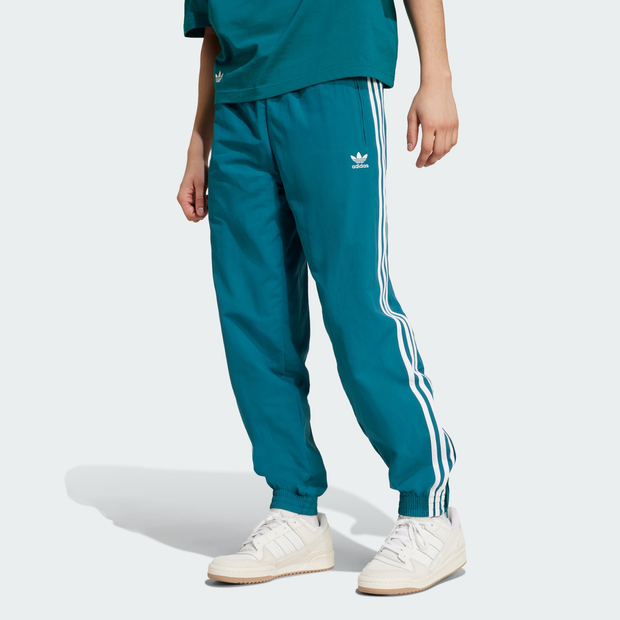 Image of Adidas Firebird male Pantaloni - Verde acqua - Tela di cotone - Foot Locker035