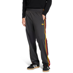 Homme Pantalons - adidas Firebird Track Tracksuit Bottoms - Utility Black-Collegiate Gold
