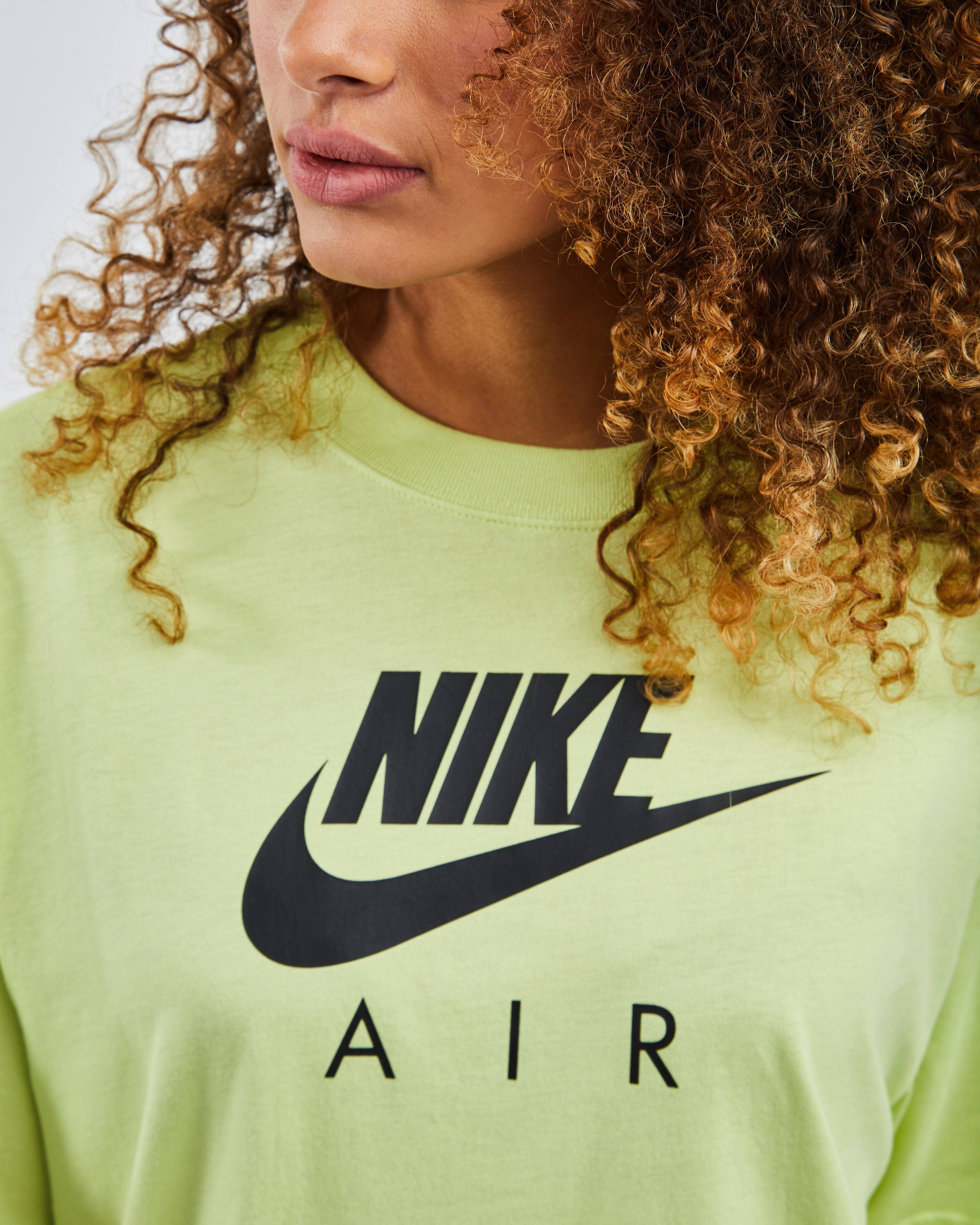 nike t shirts women's yellow