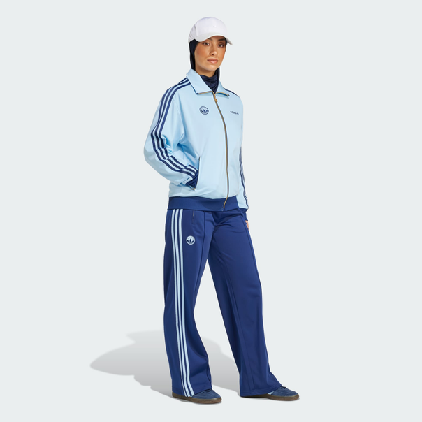 adidas Firebird Badge Trackpants Image 2 of 5. Tap to open photo gallery.