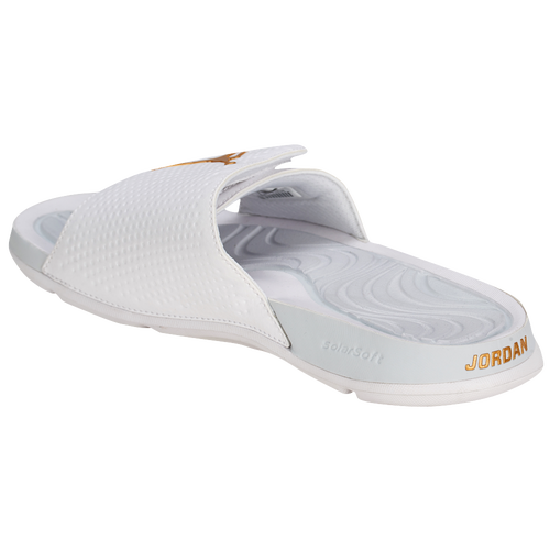 white and gold jordan slides