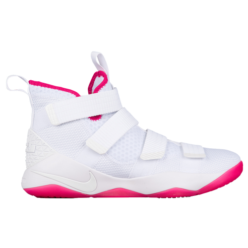 white and pink lebrons