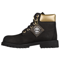 black and gold timbs