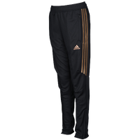 black and gold tiro pants